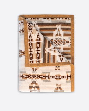 Folded white side with a corner of the reverse side with stripes showing