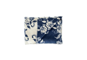 folded floral folk art navy blue deep blue blanket or throw on 